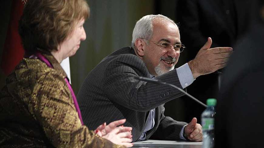Iranian Foreign Minister Mohammad Javad Zarif (R) speaks next to European Union foreign policy chief Catherine Ashton during a news conference at the end of the Iranian nuclear talks in Geneva November 10, 2013. Zarif and Ashton said on Sunday they hoped Iran and six world powers would reach an agreement when they gather again in 10 days, adding that the latest round of talks on Tehran's nuclear programme was something all delegations can build on.REUTERS/Jason Reed   (SWITZERLAND - Tags: POLITICS) - RTX157
