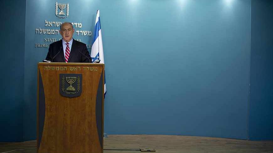 Israel's Prime Minister Benjamin Netanyahu delivers a statement at his office in Jerusalem November 24, 2013. Netanyahu on Sunday denounced the world powers' nuclear agreement with Iran as a historic mistake that left the production of atomic weapons within Tehran's reach. REUTERS/Baz Ratner (JERUSALEM - Tags: POLITICS) - RTX15R0G