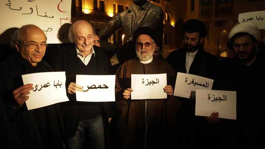 Lebanese Druze Leader Walid Jumblatt (2nd L) stands along side Shiite Muslim Cleric Hani Fahs (3rd L) during a sit in to show support for the Syrian people at  in downtown Beirut, on February 22, 2012. AFP PHOTO/JOSEPH EID (Photo credit should read JOSEPH EID/AFP/Getty Images)