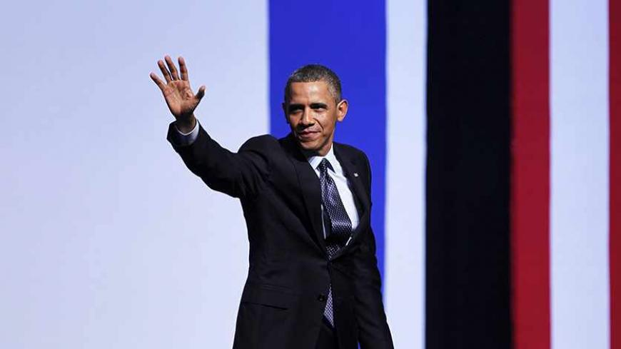 U.S. President Barack Obama waves after addressing Israeli students at the International Convention Center in Jerusalem March 21, 2013. Obama appealed directly on Thursday to the Israeli people to put themselves in the shoes of stateless Palestinians and recognise that Jewish settlement activity in occupied territory hurts prospects for peace. REUTERS/Baz Ratner (JERUSALEM - Tags: POLITICS) - RTR3FA2D