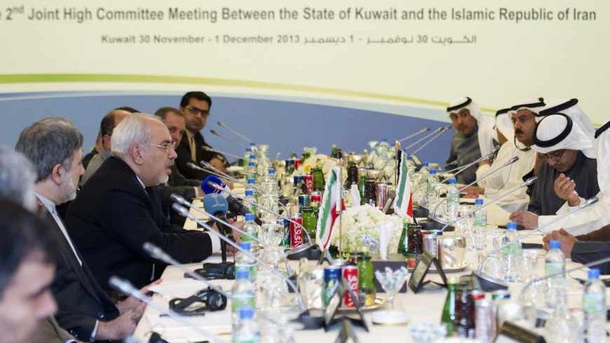 Iranian Foreign Minister Mohammad Javad Zarif (4th L) attends a meeting for the 2nd Joint High Committee in Kuwait City on December 1, 2013. REUTERS/Stephanie McGehee (KUWAIT - Tags: POLITICS) - RTX15ZK7
