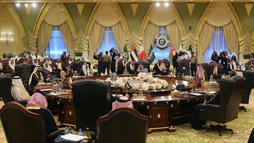 Heads of States of the Gulf Cooperation Council sit at a round table in Bayan Palace for the opening session of the 34th GCC Summit hosted by Kuwait December 10, 2013. REUTERS/Stringer (KUWAIT - Tags: POLITICS) - RTX16CHR