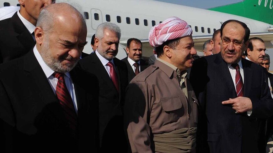 BAGHDAD - NOVEMBER 8:  In this handout image provided by the Iraqi Prime Minister office shows Kurdish leader Masoud Barazani (C) receiving Iraqi Prime Minister Nuri al-Maliki (R) and former Prime Minister and Shiite leader Ibrahim Al-Jaafari (L) on November 8, 2010 at Arbil airport 190 miles north of Baghdad, Iraq. Hosted by Kurdish leader Masoud Barazani, Iraqi political leaders met in Arbil to discuss the formation of the Iraqi government about eight months since the country's parliamentary elections.  (