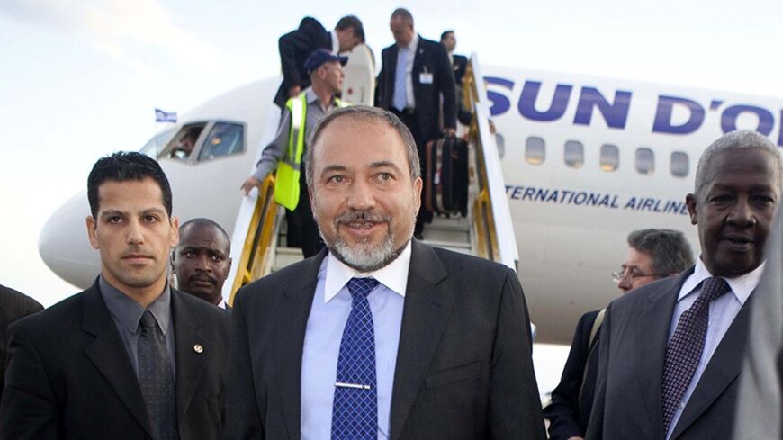 Israel's Foreign Minister Avigdor Liberman arrives at the Entebbe international airport 42km (25 miles) south of Uganda's capital Kampala, September 9, 2009. Lieberman, accompanied by business and military delegation, is on an official African visit to Ethiopia, Kenya, Ghana, Uganda, and Nigeria. REUTERS/James Akena (UGANDA POLITICS) - RTR27MUJ