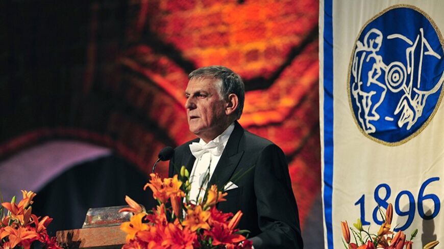 Israeli's Nobel Laureate in Chemistry Dan Shechtman speaks at the Nobel banquet in the Town Hall of Stockholm December 10, 2011. Shechtman currently works at Technion-Israel Institute of Technology in Haifa, Israel. REUTERS/Jonas Ekstromer/Scanpix (SWEDEN - Tags: POLITICS) NO COMMERCIAL SALES. SWEDEN OUT. NO COMMERCIAL OR EDITORIAL SALES IN SWEDEN. THIS IMAGE HAS BEEN SUPPLIED BY A THIRD PARTY. IT IS DISTRIBUTED, EXACTLY AS RECEIVED BY REUTERS, AS A SERVICE TO CLIENTS - RTR2V3P2