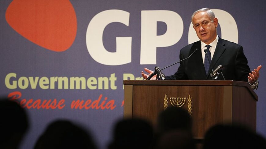 Israel's Prime Minister Benjamin Netanyahu gestures as he addresses the foreign media during a reception marking the new year, in Jerusalem January 16, 2014. REUTERS/Darren Whiteside (JERUSALEM - Tags: POLITICS) - RTX17GTF