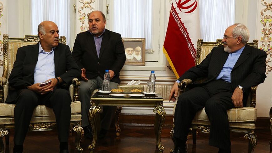 A handout picture released by Iran's Fars news agency on January 28, 2014, shows Iranian Foreign Minister Mohammad Javad Zarif (R) meeting with Palestinian Fatah member, Jibril Rajoub (L) in Tehran on January 28, 2014.  AFP PHOTO/FARS NEWS AGENCY/AZIN HAGHIGHI
--- RESTRICTED TO EDITORIAL USE - MANDATORY CREDIT "AFP PHOTO/HO/FRAS NEWS/AZIN HAGHIGHI" - NO MARKETING NO ADVERTISING CAMPAIGNS - DISTRIBUTED AS A SERVICE TO CLIENTS ---        (Photo credit should read AZIN HAGHIGHI/AFP/Getty Images)