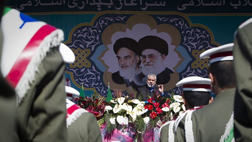 EDITORS' NOTE: Reuters and other foreign media are subject to Iranian restrictions on leaving the office to report, film or take pictures in Tehran.

Hamas Leader Ismail Haniyeh speaks during a ceremony to mark the 33rd anniversary of the Islamic Revolution, in Tehran's Azadi square February 11, 2012. REUTERS/Raheb Homavandi  (IRAN - Tags: ANNIVERSARY POLITICS RELIGION) - RTR2XN6M