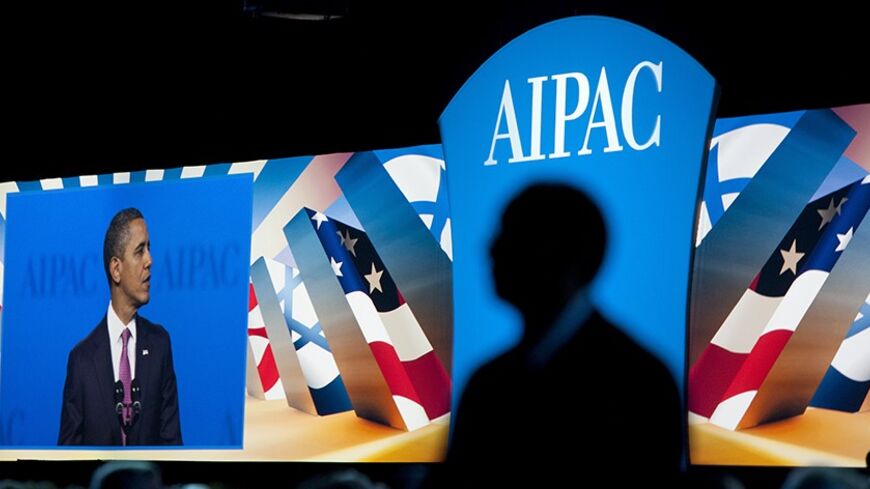 U.S. President Barack Obama is pictured on-screen speaking at the American Israel Public Affairs Committee (AIPAC) policy conference in Washington March 4, 2012.      REUTERS/Joshua Roberts    (UNITED STATES - Tags: POLITICS) - RTR2YU77
