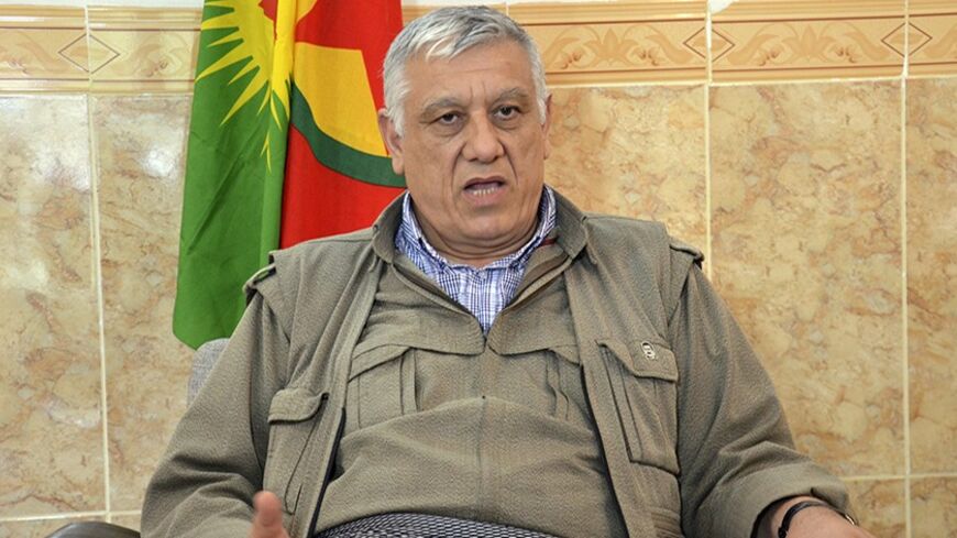 Cemil Bayik, a founding member of the Kurdistan Workers Party (PKK), speaks during an interview with Reuters at the Qandil mountains near the Iraq-Turkey border, October 19, 2013. Kurdish rebels are ready to re-enter Turkey from northern Iraq, Bayik, the head of the group's political wing said at his mountain hideout, threatening to rekindle an insurgency unless Ankara resuscitates their peace process soon. Picture taken October 19. To match Interview TURKEY-KURDS/PKK       REUTERS/Stringer (IRAQ - Tags: PO