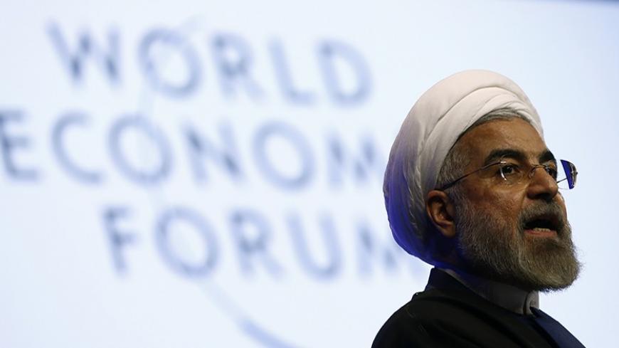 Iran's President Hassan Rouhani speaks during a session at the annual meeting of the World Economic Forum (WEF) in Davos January 23, 2014.               REUTERS/Denis Balibouse (SWITZERLAND  - Tags: POLITICS BUSINESS HEADSHOT)   - RTX17QZY