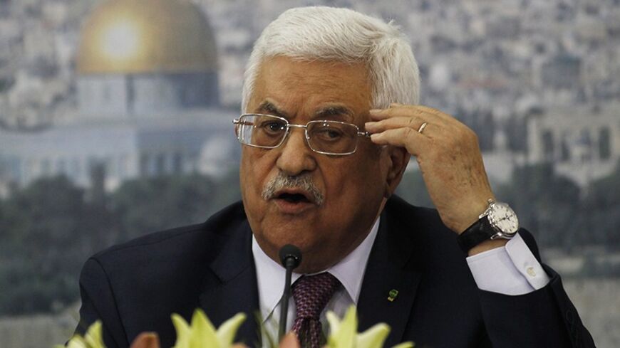 Palestinian President Mahmoud Abbas speaks during a meeting with Israeli students in the West Bank city of Ramallah February 16, 2014. Addressing a sticking point in U.S.-brokered peace talks, Abbas on Sunday dismissed charges by Israeli Prime Minister Benjamin Netanyahu that he wanted to "flood" Israel with Palestinian refugees. REUTERS/Mohamad Torokman (WEST BANK - Tags: POLITICS) - RTX18YI1