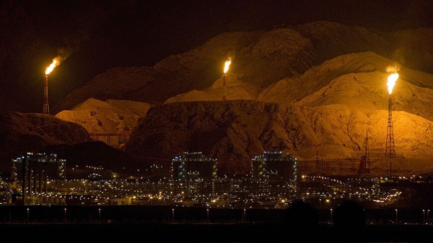 EDITORS' NOTE:  Reuters and other foreign media are subject to Iranian restrictions on their ability to film or take pictures in Tehran.

Gas refineries and petrochemical plants are seen in  Assalouyeh, 1,000 km (621 miles) south of Tehran, January 26, 2011. Picture taken January 26.  REUTERS/Caren Firouz (IRAN - Tags: BUSINESS ENERGY) - RTXX59T
