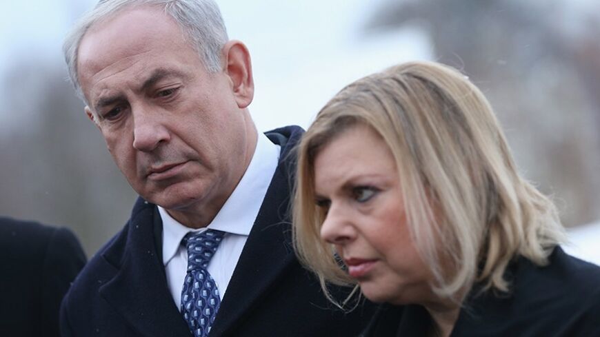BERLIN, GERMANY - DECEMBER 06:  Israeli Prime Minister Benjamin Netanyahu and his wife Sara attend a memorial service at Track 17, the place where the Nazis deported tens of thousands of Berlin Jews to concentration camps during World War II, on December 6, 2012 in Berlin, Germany. The German and Israeli governments are meeting today in Berlin for German-Israeli government consultations.  (Photo by Sean Gallup/Getty Images)