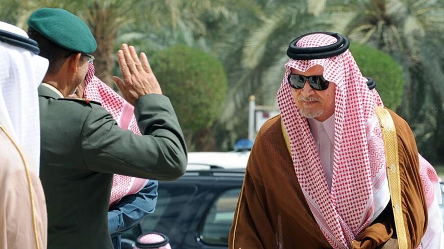 Saudi Foreign Minister Prince Saud al-Faisal bin Abdulaziz (R) is greeted by an officer upon his arrival to attend the 130th meeting of the Foreign Ministers of the Gulf Cooperation Council (GCC) in Riyadh on March 4, 2014. AFP PHOTO / FAYEZ NURELDINE        (Photo credit should read FAYEZ NURELDINE/AFP/Getty Images)