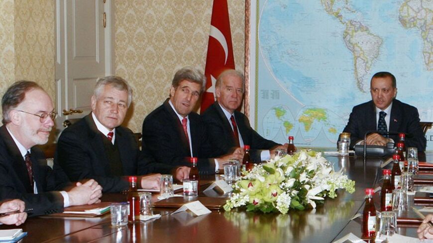 Turkey's Prime Minister Tayyip Erdogan (R) attends a meeting with U.S. Congressmen Joseph Biden (2nd R), John Kerry (C), Chuchk Hagel (2nd L) and U.S. ambassador to Turkey Ross Wilson (L) in Ankara February 22, 2008. Erdogan said on Friday he had spoken by telephone on Thursday night with U.S. President George W. Bush about Turkish troops' land offensive into northern Iraq. In his first public comments on the offensive, which began late on Thursday, Erdogan also emphasised that PKK Kurdish rebel camps were 