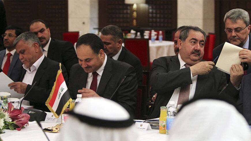 (L-R) Iraqi Transportation Minister Hadi al-Amiri, Finance Minister Rafie al-Issawi and Foreign Minister Hoshyar Zebari attend the joint Iraqi-Kuwaiti committee meeting in Baghdad, April 29, 2012. REUTERS/Ahmad Al-Rubaye/Pool (IRAQ - Tags: POLITICS) - RTR31DMN