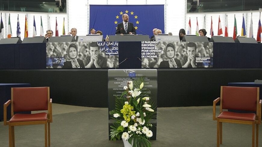 Martin Schulz (C), President of the European Parliament, delivers a speech in front of two empty chairs during the Sakharov Prize ceremony awarded in Strasbourg, December 12, 2012. The European Union's prize for human rights and freedom of thought was awarded to two Iranians, imprisoned human rights lawyer Nasrin Sotoudeh, 49, and filmmaker Jafar Panahi, 52, who have both been cut off from the outside world for defying the country's leadership.   REUTERS/Jean-Marc Loos (FRANCE - Tags: POLITICS) - RTR3BHIV