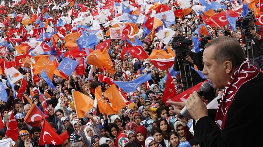 Turkey's Prime Minister Tayyip Erdogan addresses his supporters during an election rally of his ruling AK Party in Elazig March 6, 2014. Turkey will hold municipal elections on March 30. REUTERS/Umit Bektas (TURKEY - Tags: POLITICS ELECTIONS) - RTR3G491