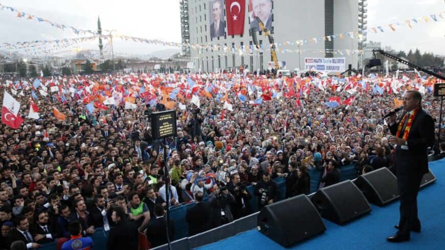 Turkey's Prime Minister Tayyip Erdogan addresses his supporters during an election rally of his ruling Ak Party (AKP) in Malatya March 6, 2014. Turkey will hold municipal elections on March 30. REUTERS/Umit Bektas (TURKEY - Tags: POLITICS ELECTIONS) - RTR3G502