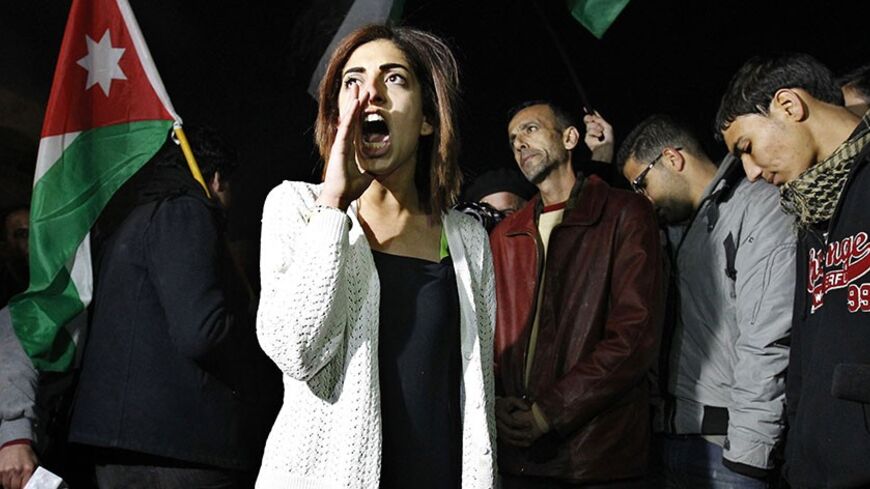 A Jordanian protester shouts slogans against Israel during a protest near the Israeli embassy in Amman March 10, 2014.The protesters were demonstrating against the shooting of a Palestinian judge from Jordan by Israeli soldiers on Monday, local media reported. Israeli soldiers shot and killed the judge in an altercation at a crossing point between Jordan and the Israeli-occupied West Bank, Palestinian officials said. The Israeli military said the man had tried to seize a soldier's gun at the Allenby bridge,