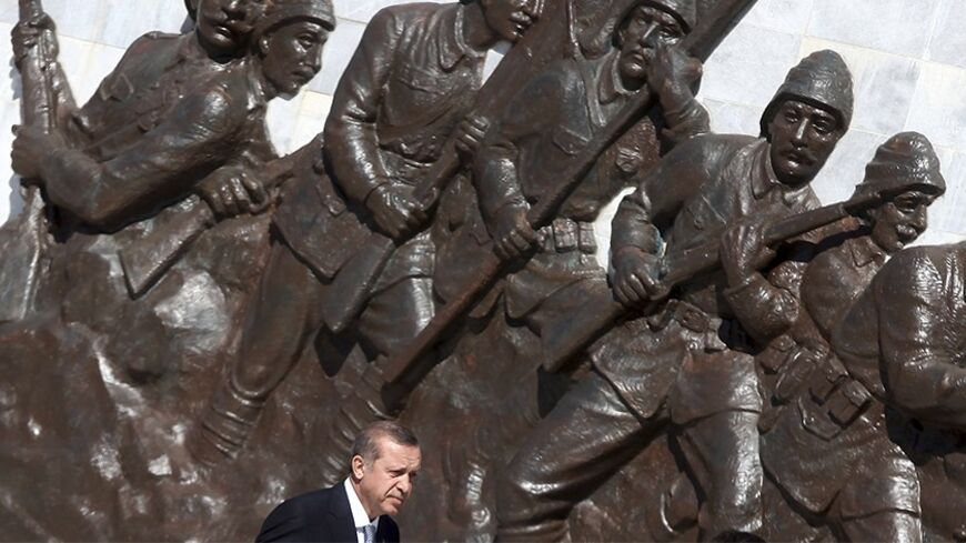 Turkish Prime Minister Tayyip Erdogan attends a ceremony marking the 99th anniversary of the end of the Gallipoli campaign in Gallipoli, March 18, 2014. REUTERS/Stringer (TURKEY - Tags: POLITICS) - RTR3HLIC