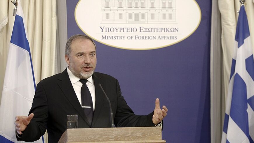 Israeli Foreign Minister Avigdor Lieberman addresses journalists during a news briefing inside Greece's Foreign Ministry in Athens March 20, 2014. Lieberman held a meeting with Greek counterpart Evangelos Venizelos over Crimea, Turkey relations and Iran nuclear talks and said there is no link between Crimea and problems in the Middle East and that Israel will not interfere.    REUTERS/Alkis Konstantinidis  (GREECE - Tags: POLITICS) - RTR3HX2I