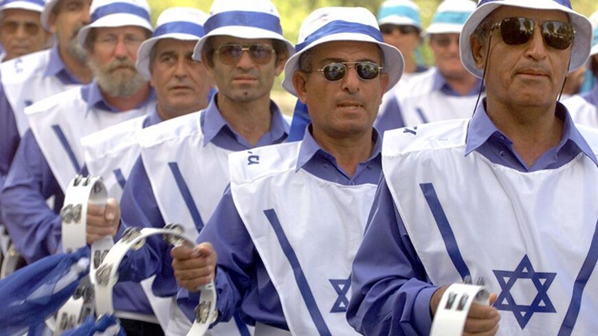Men wearing shirts with the Star of David march during a parade of
international Christian Zionist groups in the city centre of Jerusalem
on September 24, 2002. The Israeli army killed nine Palestinians
Tuesday in one of its biggest raids in the Gaza Strip and faced
international isolation over its siege of Yasser Arafat's base after
the U.N. Security Council said it must stop. REUTERS/Reinhard Krause

RKR/AH - RTRB0IQ