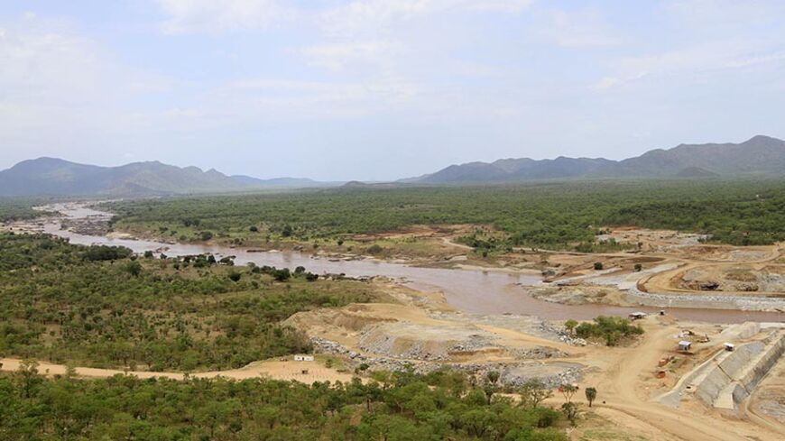 The Blue Nile flows into Ethiopia's Great Renaissance Dam in Guba Woreda, some 40 km (25 miles) from Ethiopia's border with Sudan, June 28, 2013. Egypt fears the $4.7 billion dam, that the Horn of Africa nation is building on the Nile, will reduce a water supply vital for its 84 million people, who mostly live in the Nile valley and delta. Picture taken June 28, 2013. REUTERS/Tiksa Negeri (ETHIOPIA - Tags: POLITICS SOCIETY ENERGY ENVIRONMENT) - RTX115K7