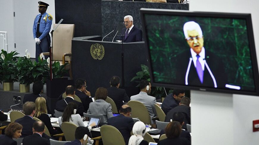 Palestinian President Mahmoud Abbas addresses the 68th United Nations General Assembly at U.N. headquarters in New York, September 26, 2013. REUTERS/Eduardo Munoz (UNITED STATES - Tags: POLITICS) - RTX140XL