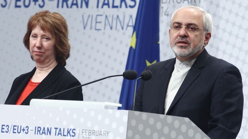 European Union foreign policy chief Catherine Ashton (L) and Iranian Foreign Minister Mohammad Javad Zarif deliver a press statement after a conference in Vienna February 20, 2014. Iran and six world powers have agreed on an agenda for negotiations over Tehran's nuclear programme and will meet again in the second half of March in Vienna. REUTERS/Heinz-Peter Bader  (AUSTRIA - Tags: POLITICS ENERGY BUSINESS) - RTX195VF