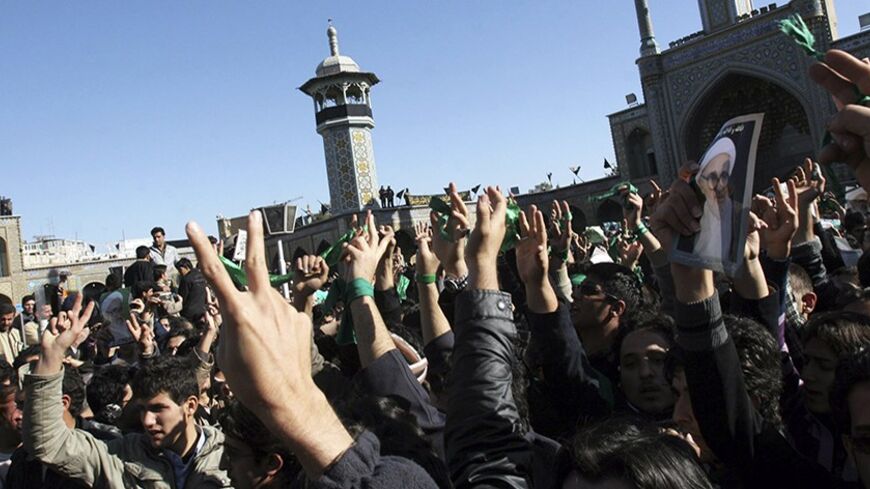 EDITORS' NOTE: Reuters and other foreign media are subject to Iranian restrictions on their ability to film or take pictures in Tehran. 

Supporters of the Iranian opposition movement wear green during the funeral of Grand Ayatollah Hossein Ali Montazeri in the holy city of Qom December 21, 2009. Big crowds of mourners chanted anti-government slogans during the funeral of Iran's leading dissident cleric, Grand Ayatollah Hossein Ali Montazeri, in the holy city of Qom on Monday, websites reported. REUTERS/via