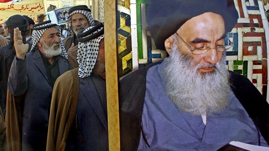 Baghdad, IRAQ:  Iraqi tribal men march behind a poster of Grand Ayatollah Ali al-Sistani during a demosntration in the holy city of Najaf, south of Baghdad, 26 February 2006. Sistani called for Iraq's powerful tribes to be deployed to protect the country's holy places after three attacks on Shiite shrines in four days, his office said. "Ayatollah Sistani, who received a tribal delegation from Kufa, asked that the Iraqi tribes reclaim their role of protecting the shrines," said an official in Sistani's offic