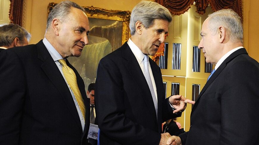 Israeli Prime Minister Benjamin Netanyahu (R) meets U.S. Senator John Kerry (D-MA) (C) and Senator Charles Schumer (D-NY) (L) at the U.S. Capitol in Washington, March 23, 2010.  REUTERS/Jonathan Ernst (UNITED STATES - Tags: POLITICS) - RTR2BZKA