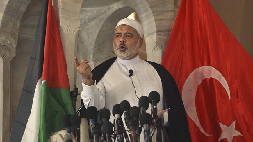 Senior Hamas leader Ismail Haniyeh speaks about  Israel's seizure of a Gaza-bound aid ship, during Friday prayers at al-Omari mosque in Gaza City June 4, 2010. Israeli marines stormed the Turkish aid ship bound for Gaza on Monday and at least nine pro-Palestinian activists were killed, triggering a diplomatic crisis and an emergency session of the U.N. Security Council.   REUTERS/Mohammed Salem (GAZA - Tags: POLITICS CIVIL UNREST) - RTR2ER1A