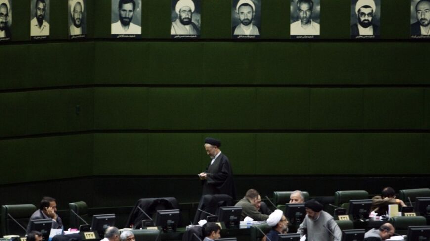 EDITORS' NOTE: Reuters and other foreign media are subject to Iranian restrictions on their ability to film or take pictures in Tehran.
Lawmakers attend a parliament session in Tehran January 29, 2012. REUTERS/Raheb Homavandi  (IRAN - Tags: POLITICS) - RTR2X0YQ