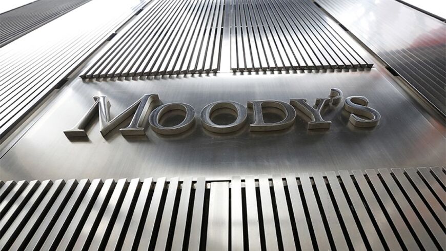 A Moody's sign is displayed on 7 World Trade Center, the company's corporate headquarters in New York, February 6, 2013. REUTERS/Brendan McDermid (UNITED STATES - Tags: BUSINESS) - RTR3DFKX