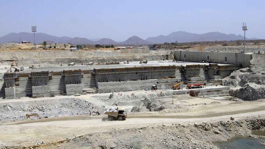 A general view shows construction activity on the Grand Renaissance dam in Guba Woreda, Benishangul Gumuz region March 16, 2014. Egypt fears the $4.7 billion dam, that the Horn of Africa nation is building on the Nile, will reduce a water supply vital for its 84 million people, who mostly live in the Nile valley and delta. Picture taken March 16, 2014. REUTERS/Tiksa Negeri (ETHIOPIA - Tags: ENERGY ENVIRONMENT POLITICS BUSINESS CONSTRUCTION) - RTR3HFQT