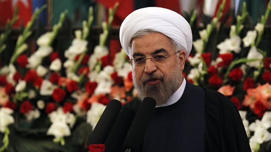 Iran's President Hassan Rouhani speaks during an event to mark Nawroz, the Persian New Year, in Kabul March 27, 2014. REUTERS/Omar Sobhani (AFGHANISTAN - Tags: ANNIVERSARY POLITICS) - RTR3ITE2