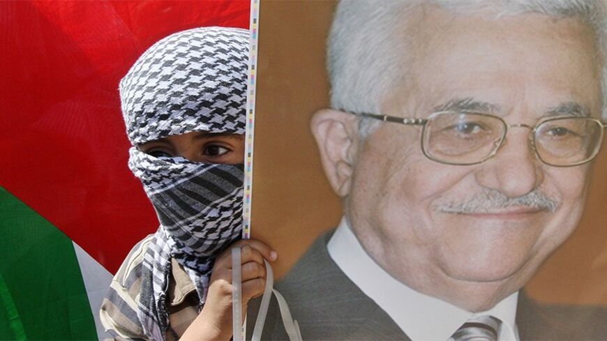 A masked Palestinian boy holds a picture of Palestinian President Mahmoud Abbas during a Fatah demonstration in support of Abbas in the West Bank village of Kofr Qadoum near Nablus April 4, 2014. REUTERS/Abed Omar Qusini (WEST BANK - Tags: POLITICS CIVIL UNREST) - RTR3JYJS