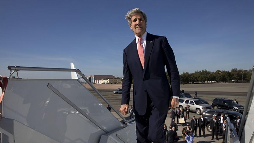 U.S. Secretary of State John Kerry boards his plane to leave Mohammed V International Airport in Casablanca for a return to the United States April 4, 2014. REUTERS/Jacquelyn Martin/Pool (MOROCCO - Tags: POLITICS) - RTR3K0J3