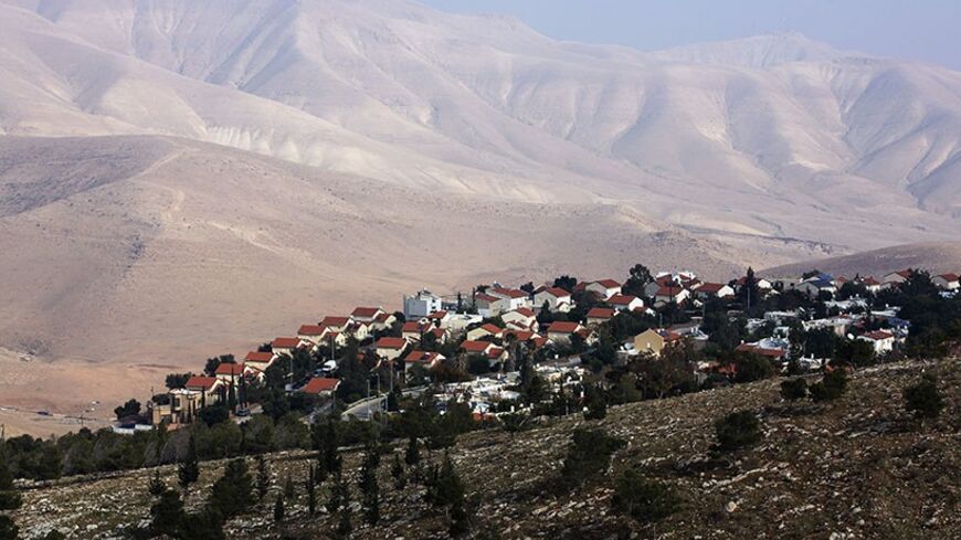 Houses can be seen at the Jewish West Bank settlement of Maale Efrayim in the Jordan Valley January 1, 2014. A panel of Israeli cabinet ministers endorsed proposed legislation on Sunday to annex an area of the occupied West Bank likely to be the eastern border of a future Palestinian state. The Jordan Valley region of the West Bank which Israel captured in a 1967 war and Palestinians seek as part of their future state, has been a focus of recent disagreement. Palestinians reject Israel's demand to maintain 