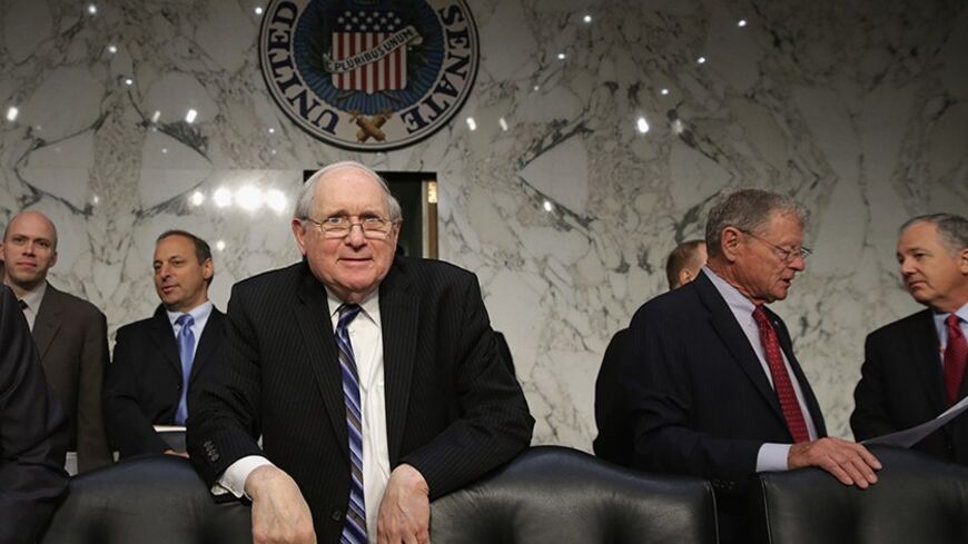 WASHINGTON, DC - MAY 06:  Senate Armed Services Committee Chairman Carl Levin (D-MI) arrives for a hearing with the U.S. military Joint Chiefs of Staff testify on Capitol Hill May 6, 2014 in Washington, DC. Joined by senior enlisted officers, the Joint Chiefs testified about proposals relating to military compensation.  (Photo by Chip Somodevilla/Getty Images)