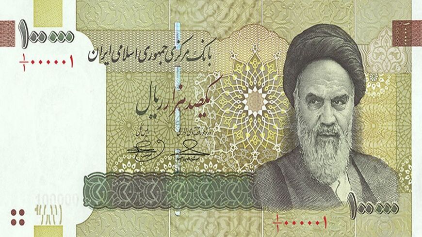 EDITORS' NOTE: Reuters and other foreign media are subject to Iranian restrictions on leaving the office to report, film or take pictures in Tehran.    
The front of the new Iranian 100,000 Rials  (about $10) bank note, bearing a picture of Iran's late leader Ayatollah Ruhollah Khomeini, is seen in this handout picture released to Reuters June 22, 2010. REUTERS/ISNA/Handout (IRAN - Tags: BUSINESS) FOR EDITORIAL USE ONLY. NOT FOR SALE FOR MARKETING OR ADVERTISING CAMPAIGNS - RTR2FJQN