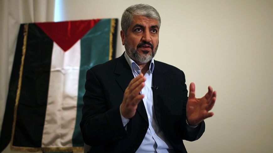 Hamas leader Khaled Meshaal speaks during his interview with Reuters in Doha November 29, 2012. Meshaal said the de facto recognition of a sovereign Palestinian state won by his rival Mahmoud Abbas should be seen alongside Gaza's latest conflict with Israel as a single, bold strategy that could empower all Palestinians. Meshaal said the short war which claimed 162 Palestinian lives and five Israelis was concluded on terms set by the Palestinian Islamist movement and ended its isolation, creating a new mood 