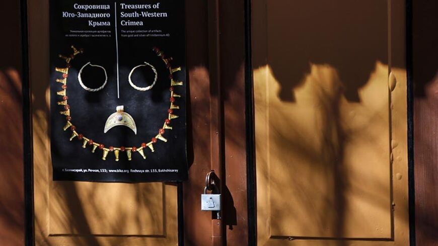 A sign is pictured inside the 16th-century Tatar Khans' palace in Bakhchisaray April 2, 2014. From the 16th-century Tatar Khans' palace in Bakhchisaray to the former tsarist residence that hosted the World War Two Yalta conference, Crimea's heritage sites have become a source of bitter contention since Russia seized the region from Ukraine.   REUTERS/Yannis Behrakis  (UKRAINE - Tags: TRAVEL SOCIETY) - RTR3JPF8