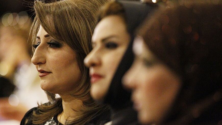 Iraqi women candidates attend a debate forum in Baghdad, April 19, 2014.  As Iraq's general election draws closer, both men and women are vying for seats in the country's parliament. But this year's election, the first one after the withdrawal of U.S troops in 2011, has seen an increase in the number of female candidates. According to an Iraqi election official, women make up around 30 to 35 percent of the candidates in the April 30 election. "The total number of nominees in the 2010 parliamentary election 