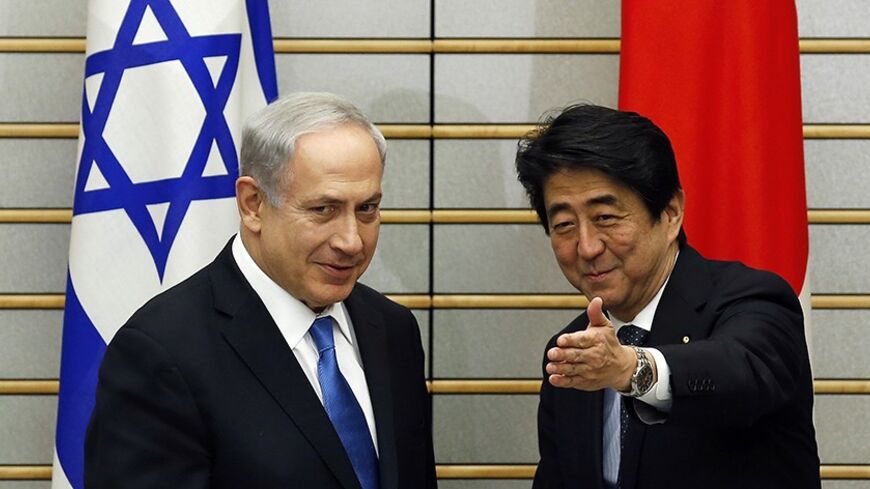 Israel's Prime Minister Benjamin Netanyahu (L) meets with Japan's Prime Minister Shinzo Abe at the start of their meeting at the prime minister's official residence in Tokyo May 12, 2014.   REUTERS/Toru Hanai (JAPAN - Tags: POLITICS) - RTR3OR0F
