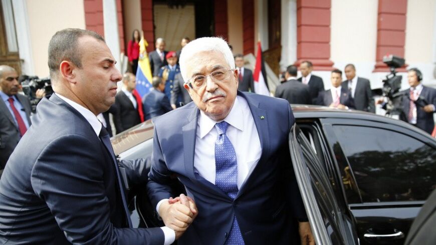 Palestinian President Mahmoud Abbas arrives for a meeting with Venezuela's President Nicolas Maduro at Miraflores Palace in Caracas May 16, 2014. Abbas is on an official visit to Venezuela. REUTERS/Jorge Silva (VENEZUELA  - Tags: POLITICS) - RTR3PJG0