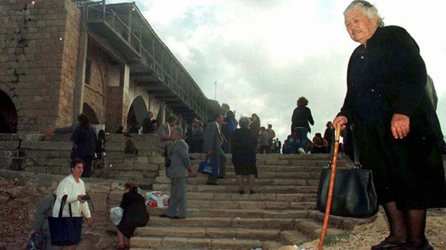 Greek Cypriot pilgrims gather outside St. Apostol Andreas monastery on the Karpas peninsula in northern Cyprus, November 30. More than one thousand Greek Cypriots today visited the monastery in the Turkish part of island to attend the annual pilgrimage. Nearly 500 Greek Cypriots had visited the monastery for first time in 23 years in August this year.

CYPRUS PILGRIMS - RTR964H